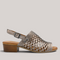Grundy's Shoes Cabello Alaca metallic laser-cut leather sandal with a low block heel and adjustable slingback strap.