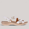 Grundy's Shoes Revere Nagoya white leather sandal with adjustable straps, gold hardware, and cushioned beige sole.