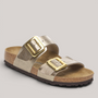 Grundy's Shoes Birkenstock Sydney sandal in metallic gold Birko-Flor with two straps and large gold buckles.