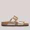 Grundy's Shoes Birkenstock Sydney sandal in metallic gold Birko-Flor with two straps and large gold buckles.
