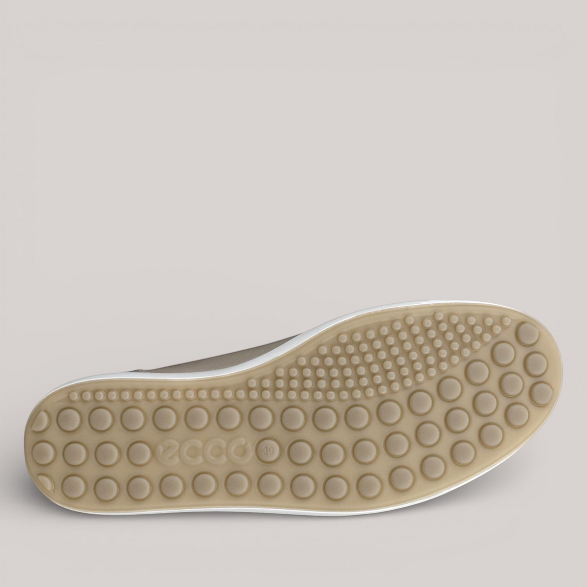 Grundy's Shoes ECCO Soft 7 women's sneaker showing the textured, flexible PU outsole with circular grip pattern.