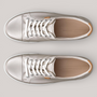 Grundy's Shoes ECCO Soft 7 women's metallic silver leather lace-up sneakers with white laces and cushioned insoles.