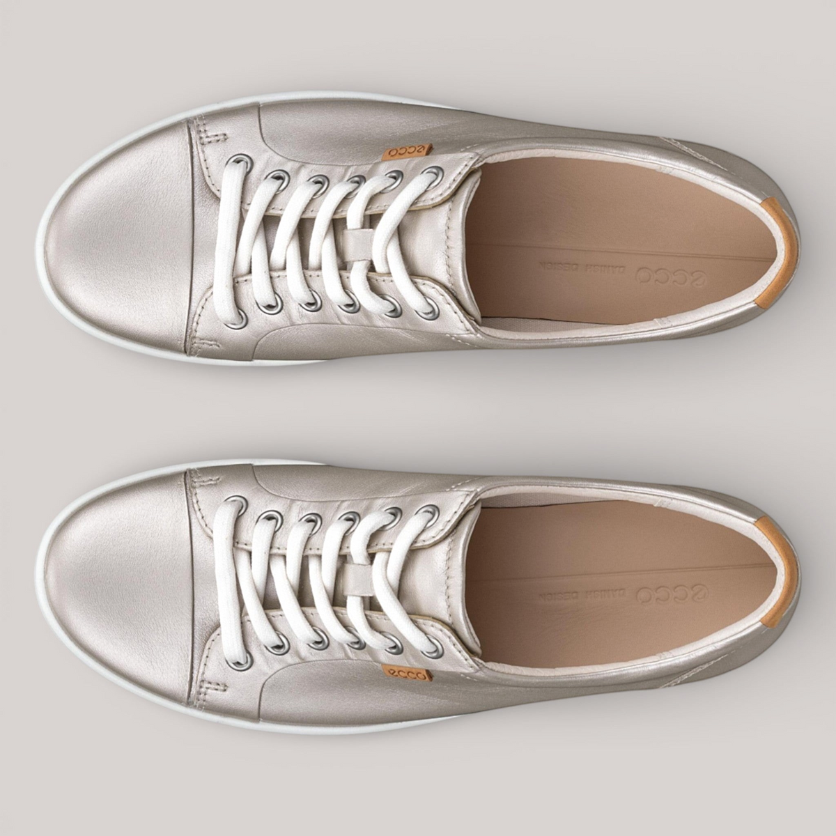 Grundy's Shoes ECCO Soft 7 women's metallic silver leather lace-up sneakers with white laces and cushioned insoles.