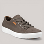 Grundy's Shoes ECCO Soft 7 men's brown leather sneaker with a white sole and lace-up design.