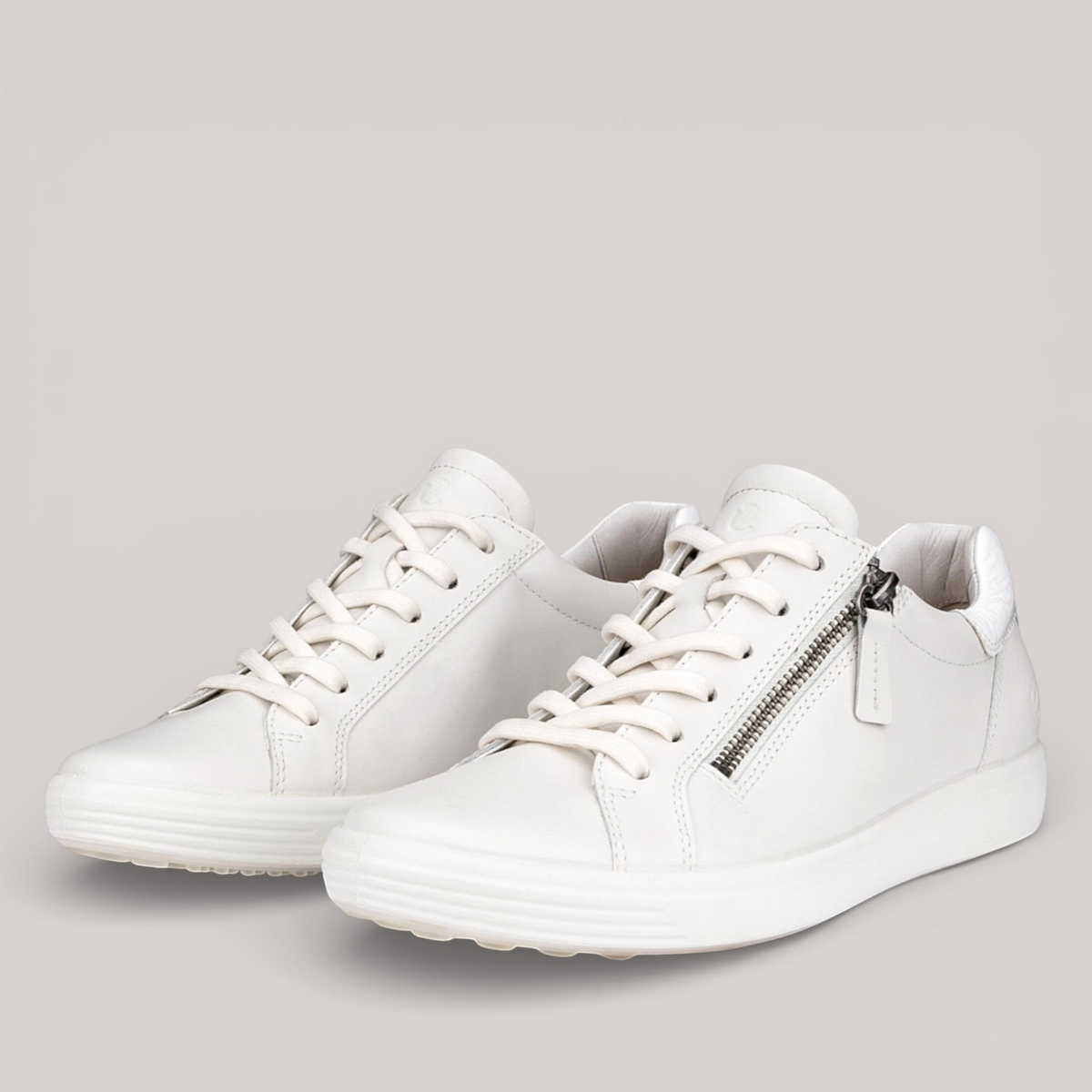 Grundy's Shoes ECCO Soft 7 women's white full grain leather sneakers with side zip and lace-up closure.