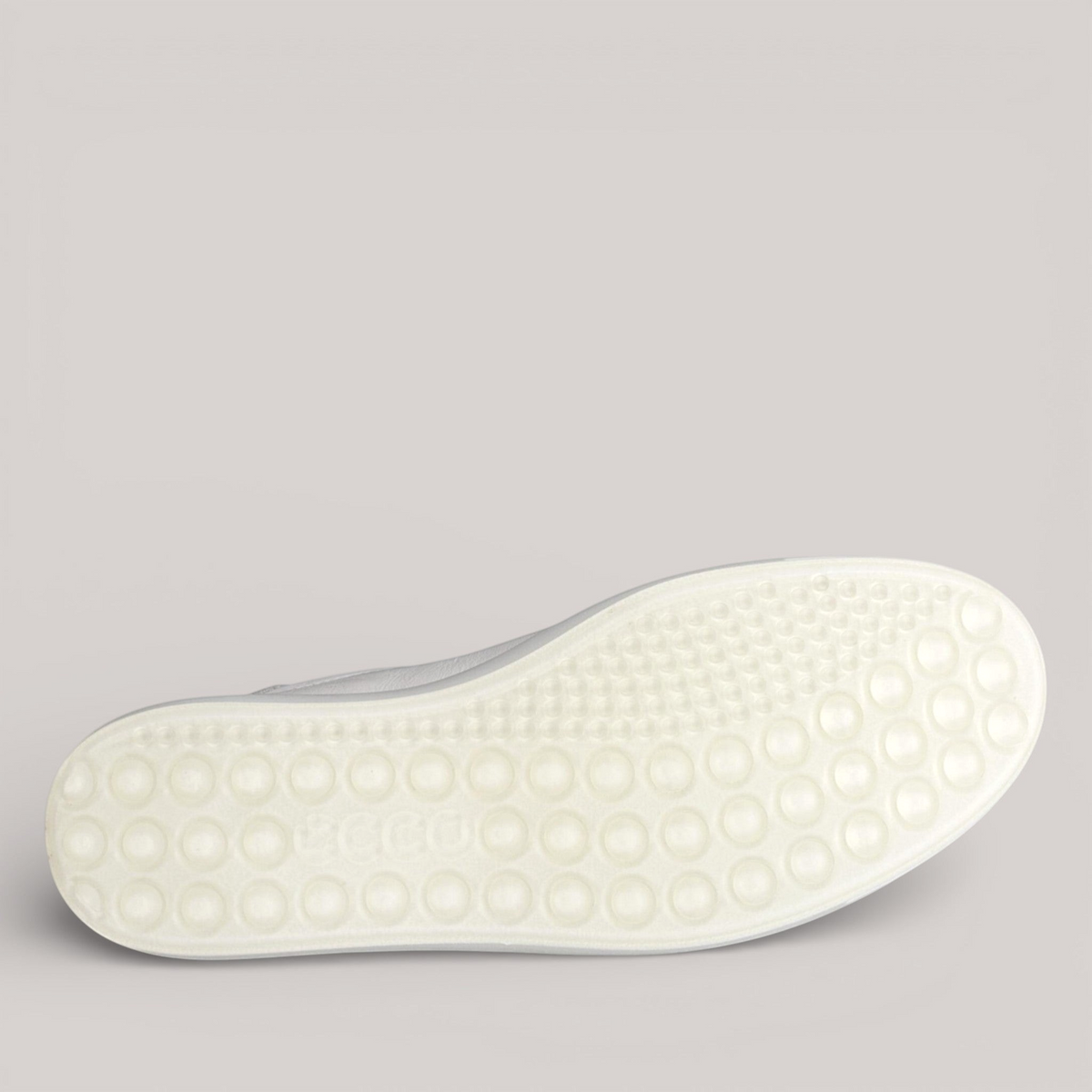 Grundy's Shoes ECCO Soft 7 women's sneaker showing the textured white rubber outsole with circular grip pattern