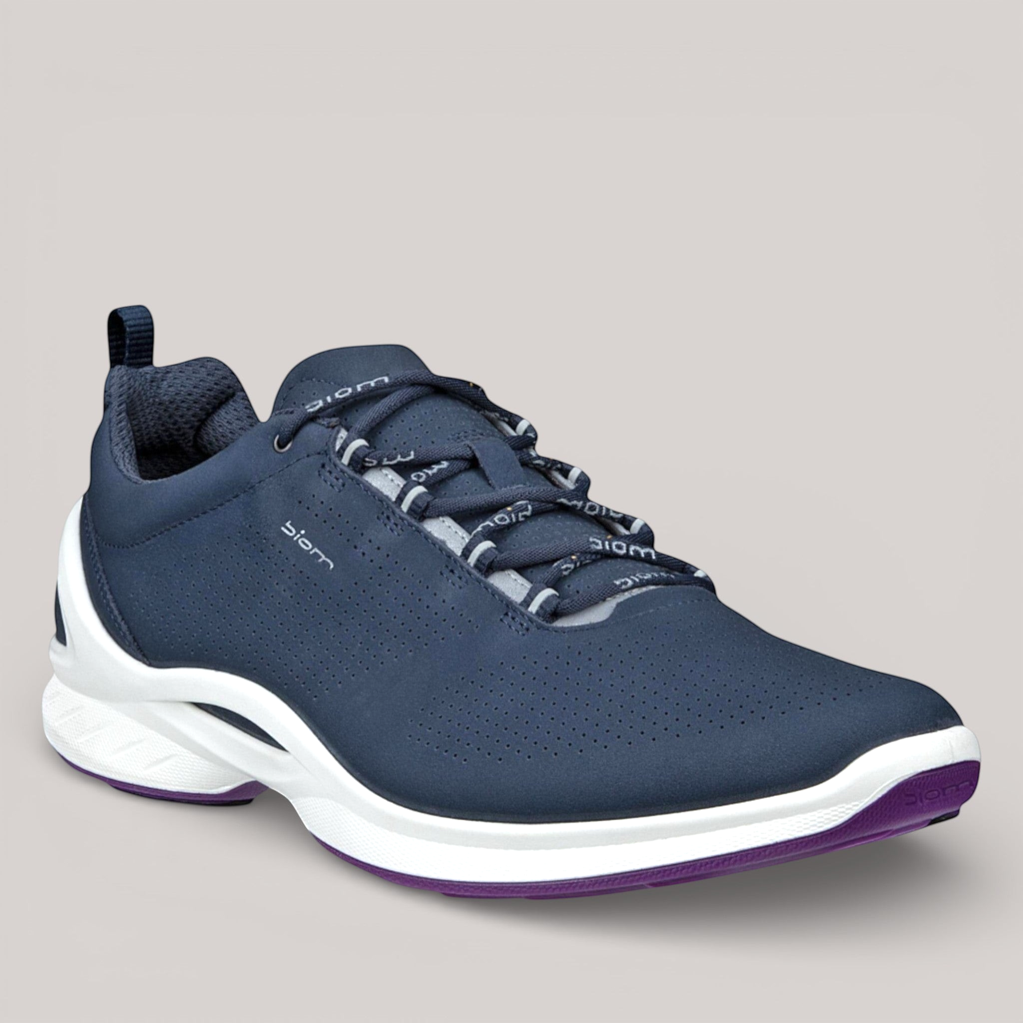 Grundy's Shoes ECCO Biom Fjuel women's navy leather sneaker with breathable perforations and white cushioned sole.