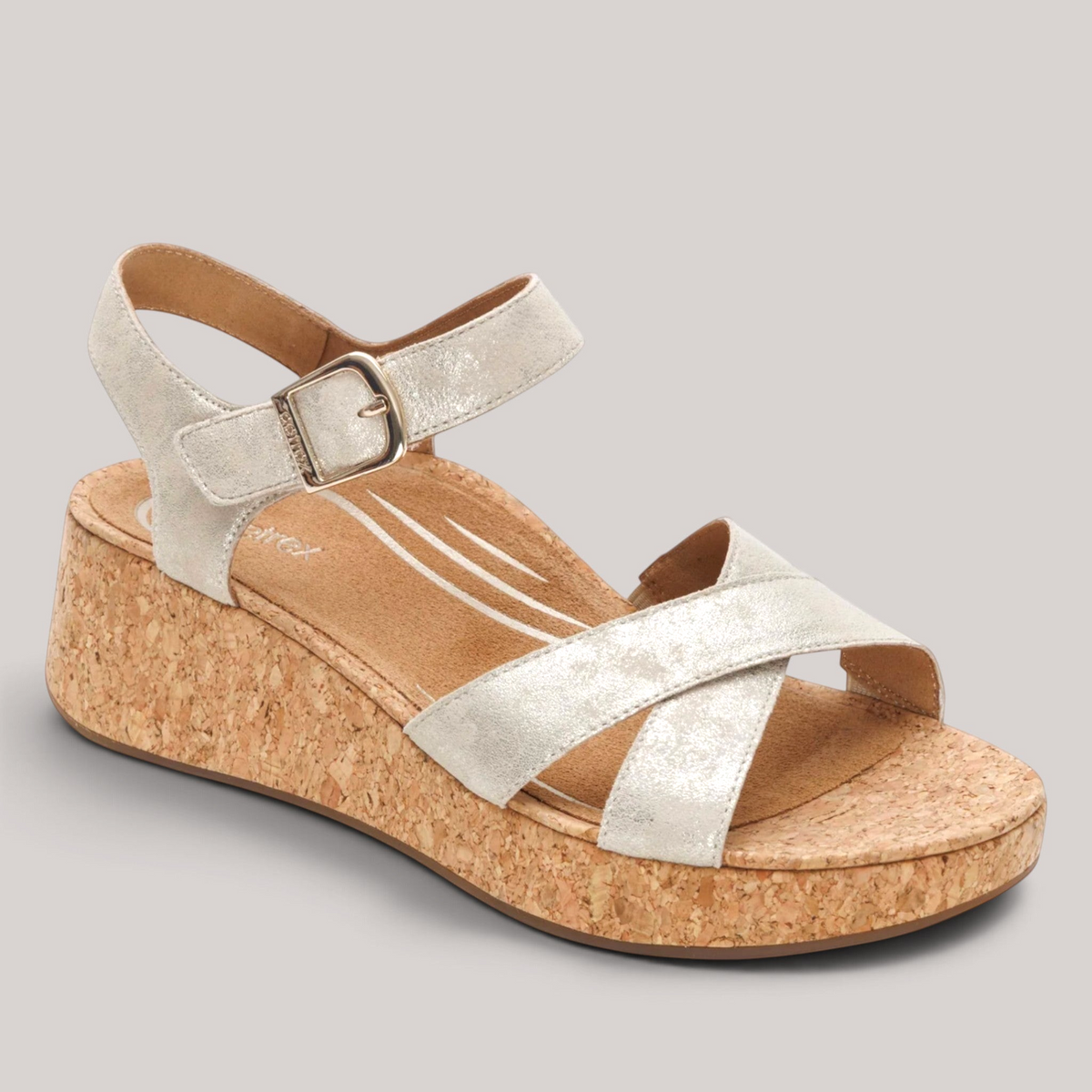 Grundy's Shoes Aetrex Flora silver leather wedge sandals with adjustable cross straps and cork-style footbed.