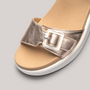 Grundy's Shoes Ara Madeira metallic gold leather sandal with a decorative square buckle and comfortable wedge sole.