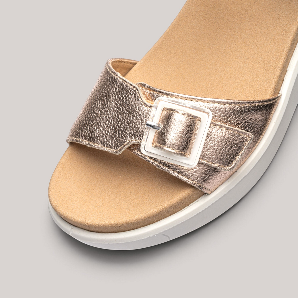 Grundy's Shoes Ara Madeira metallic gold leather sandal with a decorative square buckle and comfortable wedge sole.