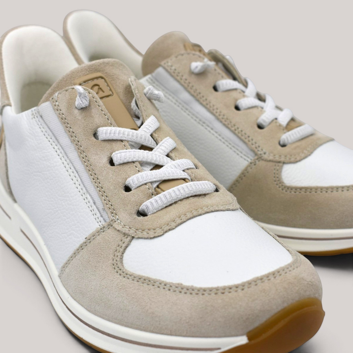 Grundy's Shoes Ara Osaka 2.0 sneakers in white leather and beige suede with elastic laces and rubber soles.