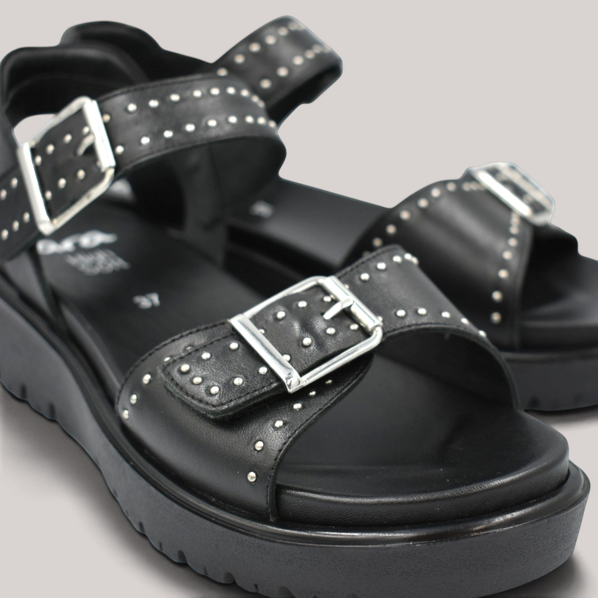 Grundy's Shoes Ara Bilboa black leather wedge sandals with silver rivet embellishments and adjustable buckle straps.