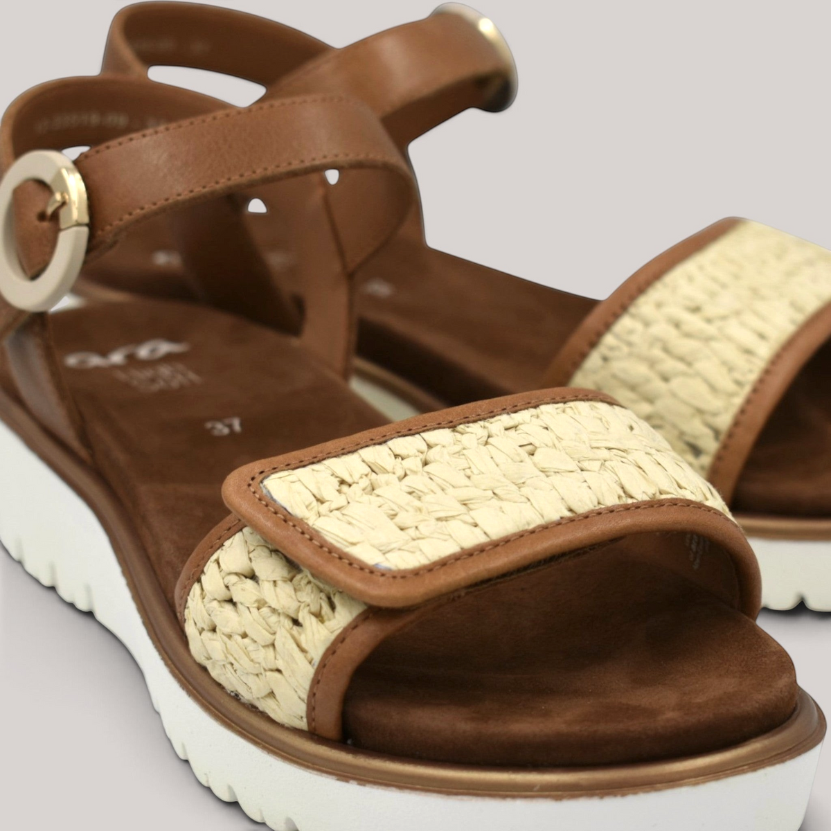 Grundy's Shoes Ara Bilbao brown leather wedge sandals with cream raffia detailing and adjustable Velcro straps.