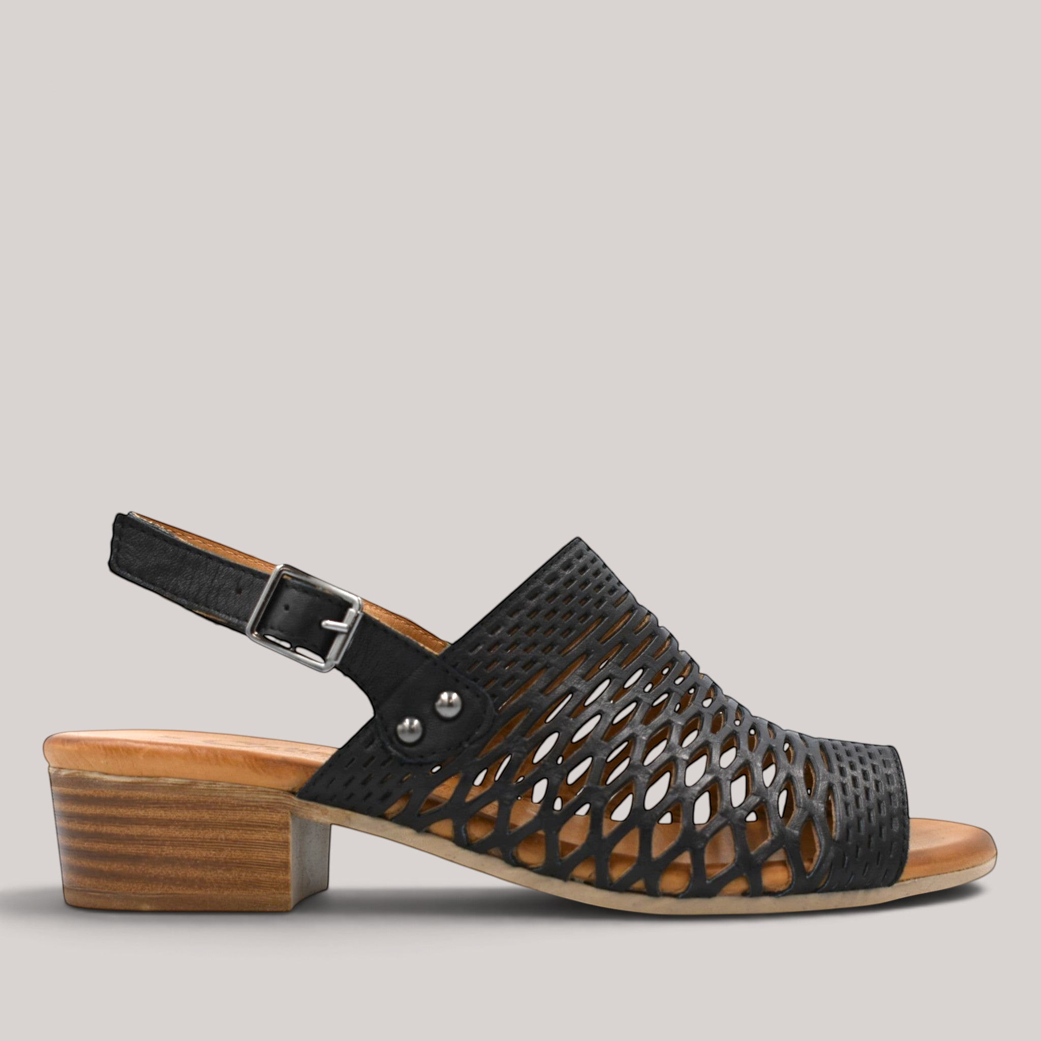 Grundy's Shoes Cabello Alaca black leather sandal with laser-cut upper, adjustable slingback strap, and block heel.