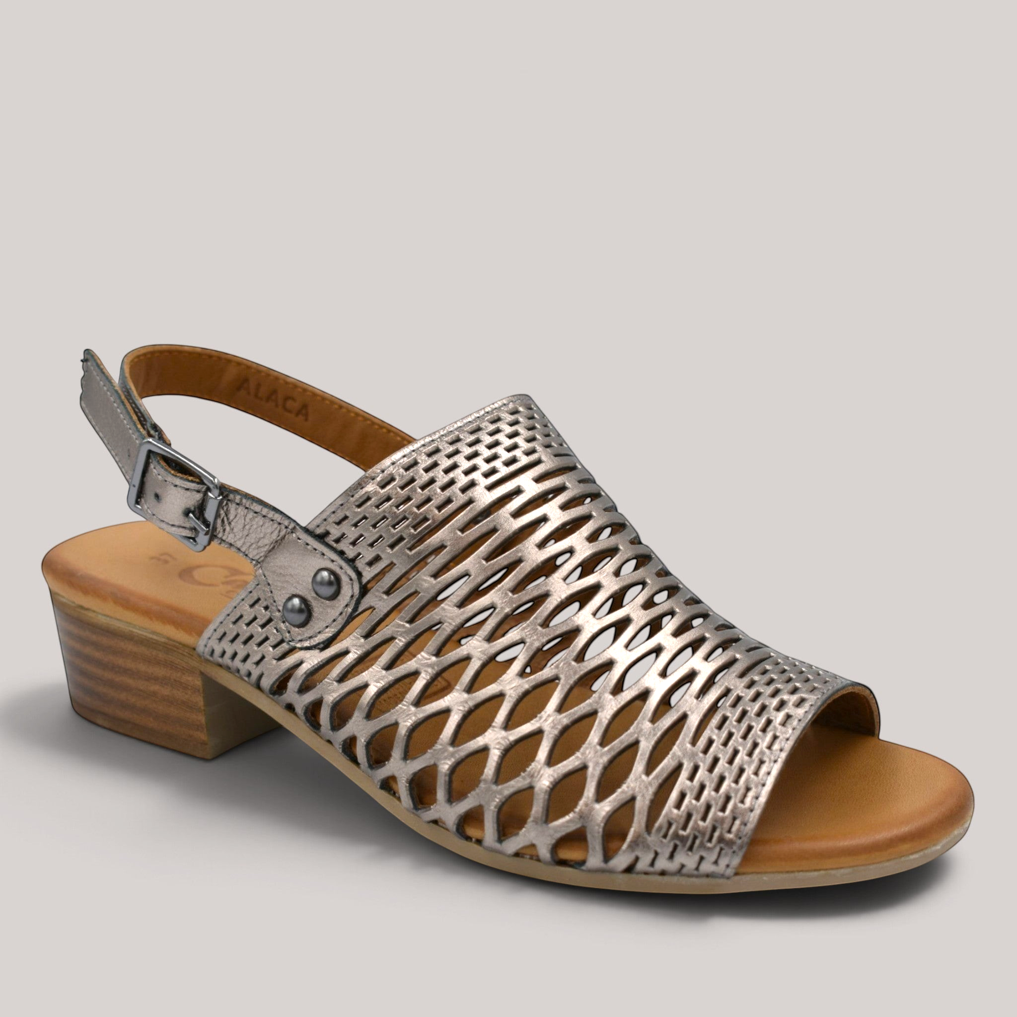 Grundy's Shoes Cabello Alaca metallic silver laser-cut leather sandal with a low block heel and adjustable strap