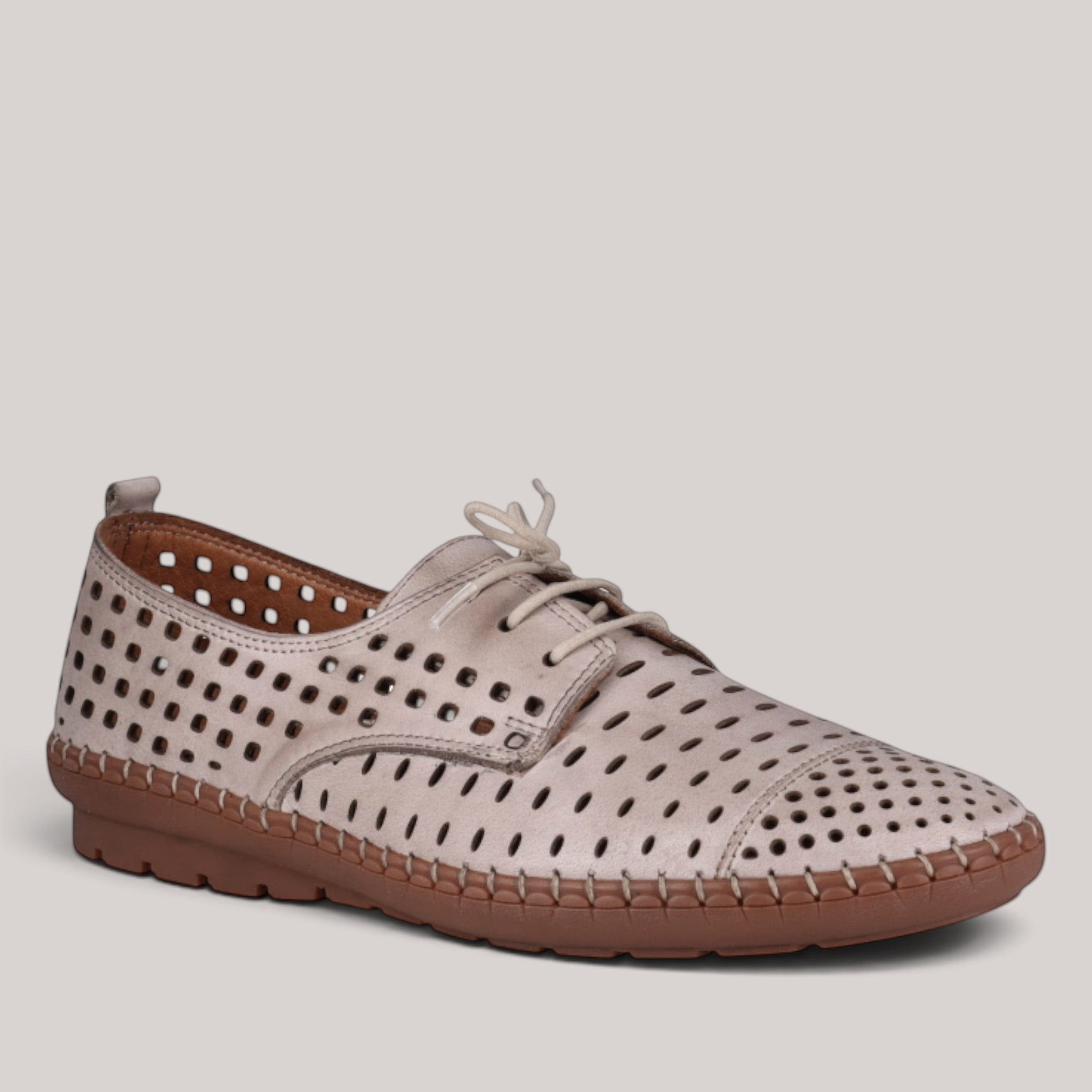 Grundy's Shoes Cabello Kroon beige perforated leather lace-up shoe with a brown sole and orthotic-friendly design.