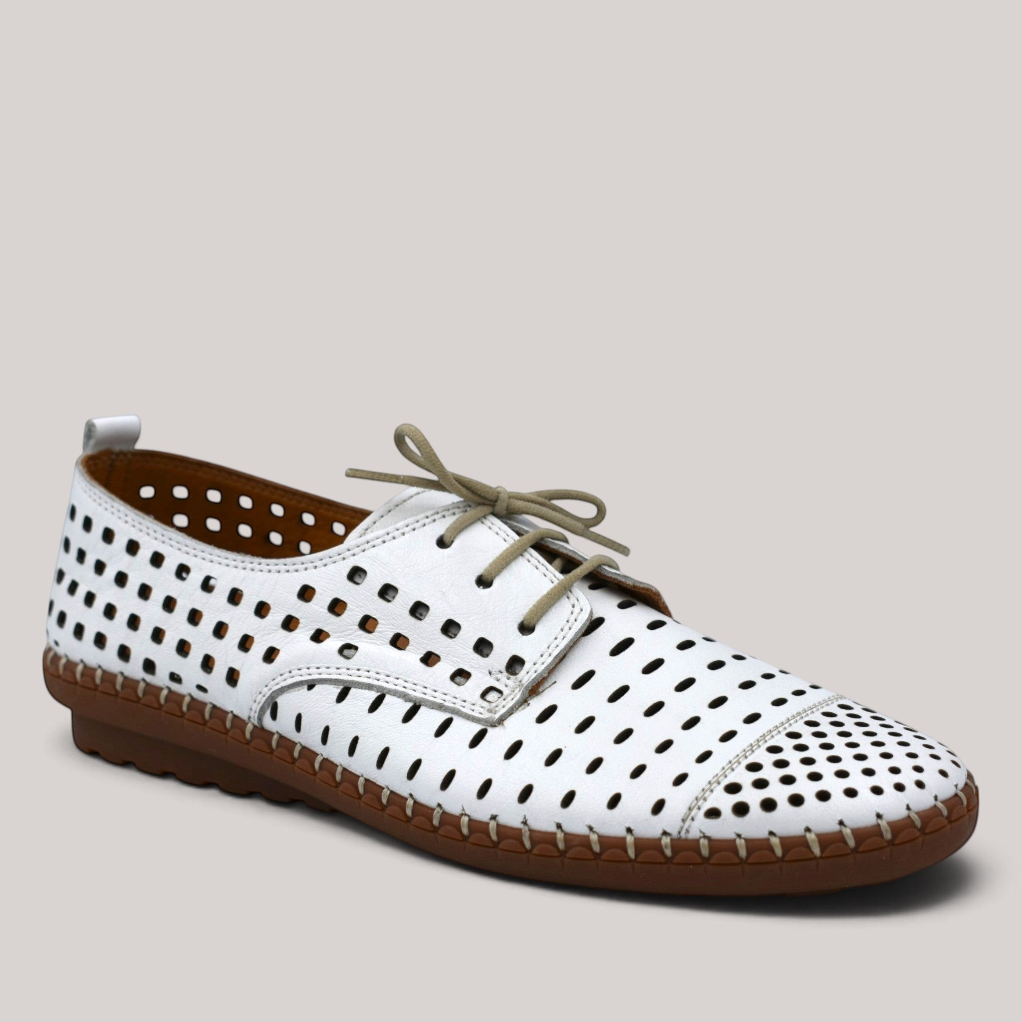 Grundy's Shoes Cabello Kroon white perforated leather lace-up shoe with a brown stitched sole and padded insole.