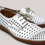 Grundy's Shoes Cabello Kroon white perforated leather lace-up shoes with brown stitched sole and padded insole.
