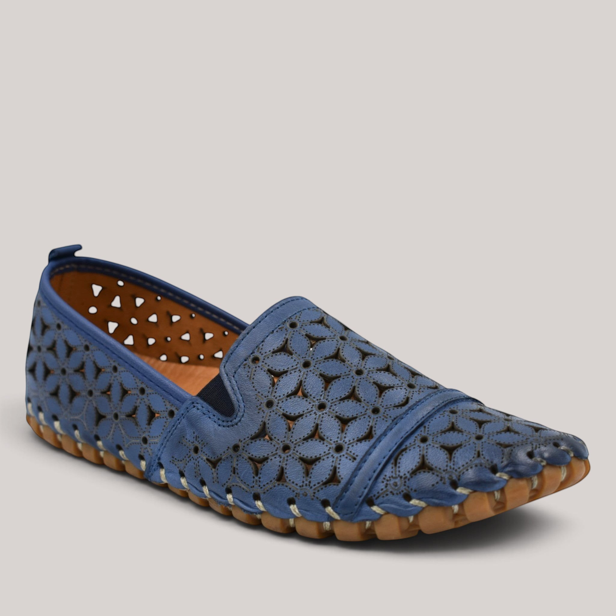 Grundy's Shoes Cabello Muriel navy blue leather slip-on shoe with floral laser-cut details and rubber sole