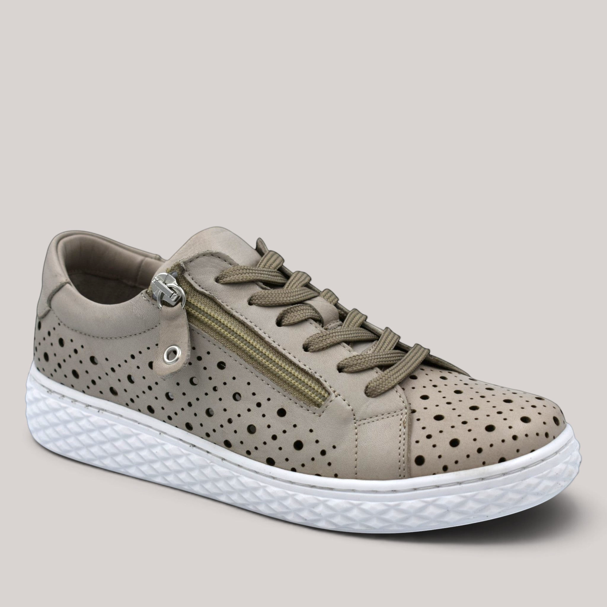 Grundy's Shoes Cabello Uptown grey perforated leather sneaker with side zip, lace-up closure, and white rubber sole.