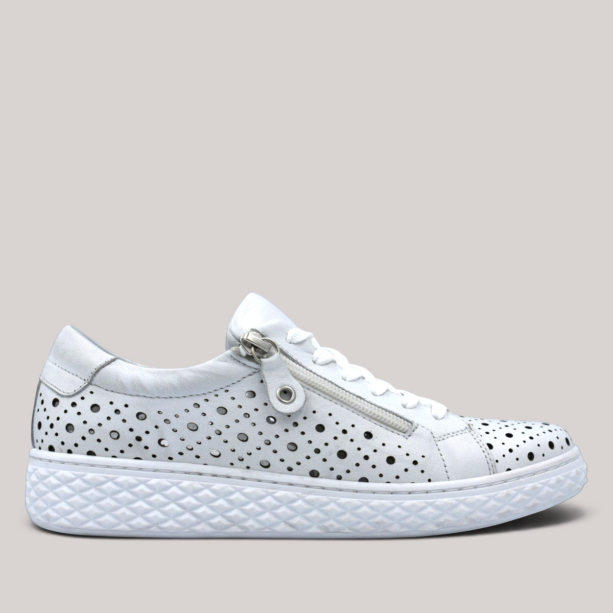Grundy's Shoes Cabello Uptown white perforated leather sneaker with side zip and textured rubber sole