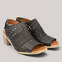 Grundy's Shoes Cabello Wilder black leather sandals with punched geometric cutouts, square toe, and block heel.