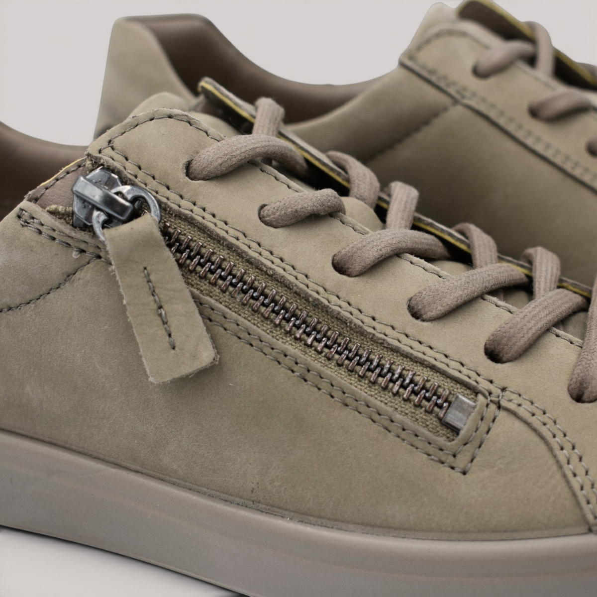 Grundy's Shoes ECCO Soft 7 women's sneaker in taupe leather with side zip closure and matching laces