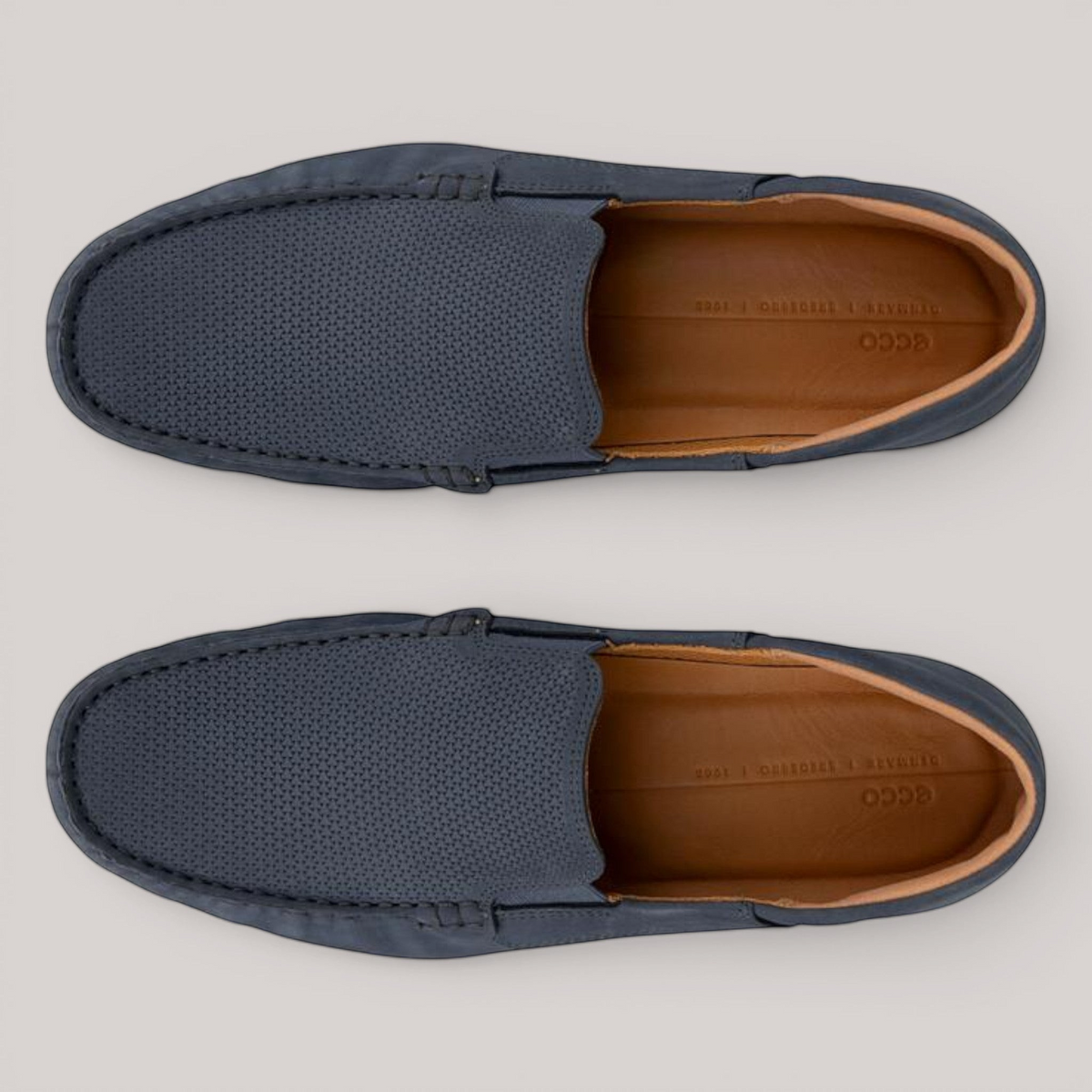 Grundy's Shoes ECCO S Lite Moc navy blue perforated leather slip-on loafers with tan leather interior lining