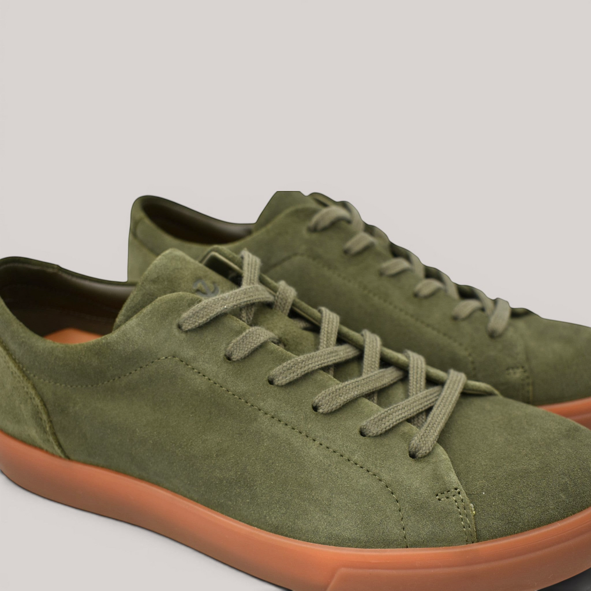 Grundy's Shoes ECCO Soft 10 men's olive green suede sneakers with a durable gum rubber sole and lace-up closure.