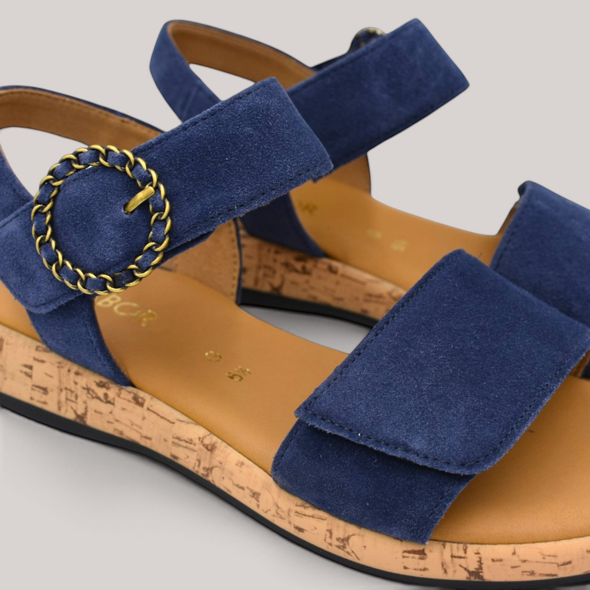 Grundy's Shoes Gabor 82734 navy blue nubuck sandals with a decorative buckle, velcro strap, and cork-look wedge sole.