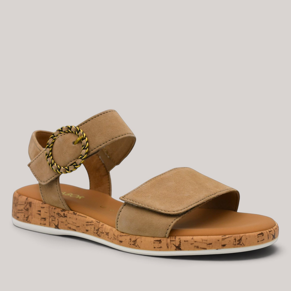 Grundy's Shoes Gabor 82734 beige nubuck sandals with a decorative buckle, velcro strap, and cork-look wedge sole.