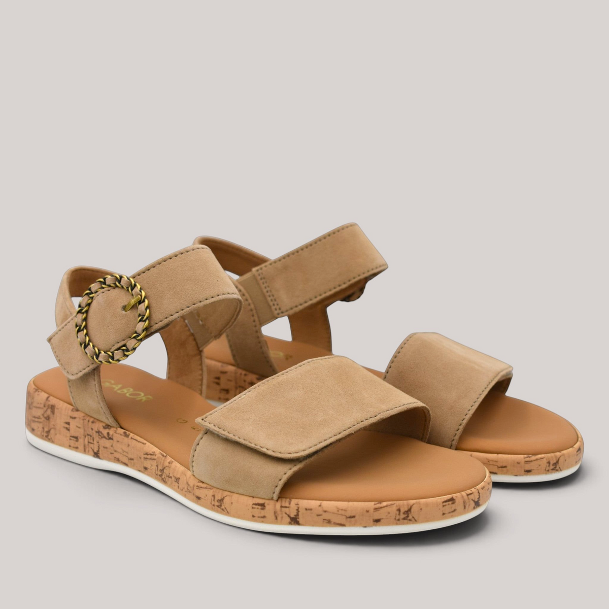 Grundy's Shoes Gabor 82734 beige nubuck sandals with adjustable velcro straps, decorative buckle, and cork-look wedge.