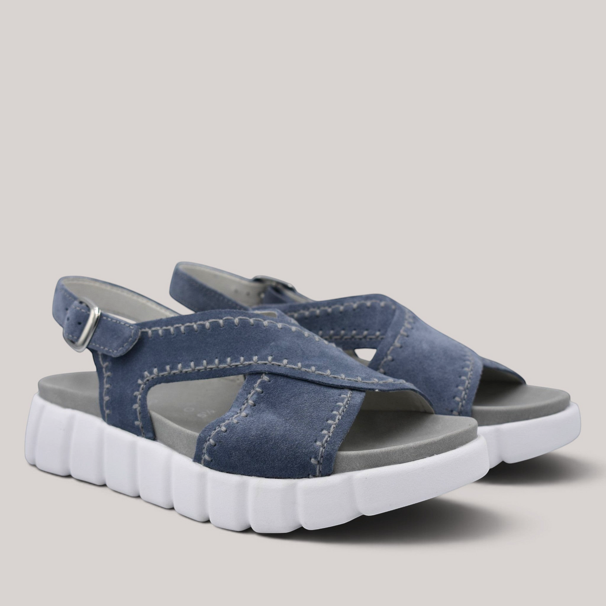 Grundy's Shoes Gabor 82891 blue nubuck crossover sandals with a cushioned footbed and chunky white sole.