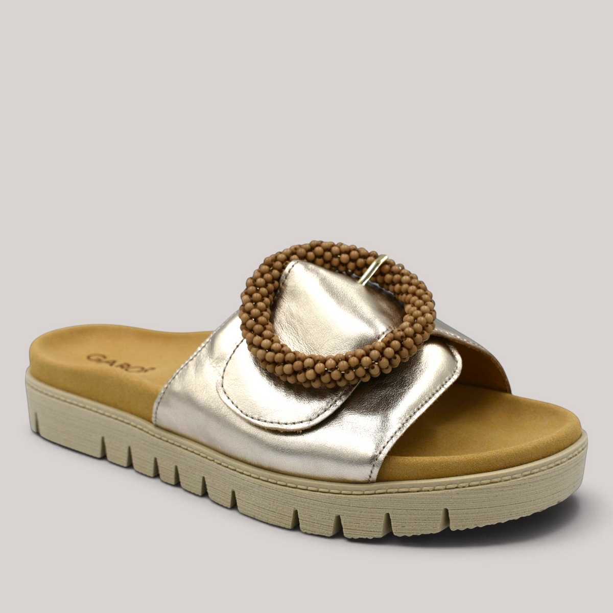 Grundy's Shoes Gabor 83745 metallic leather slide sandal with a beaded buckle and contoured footbed.