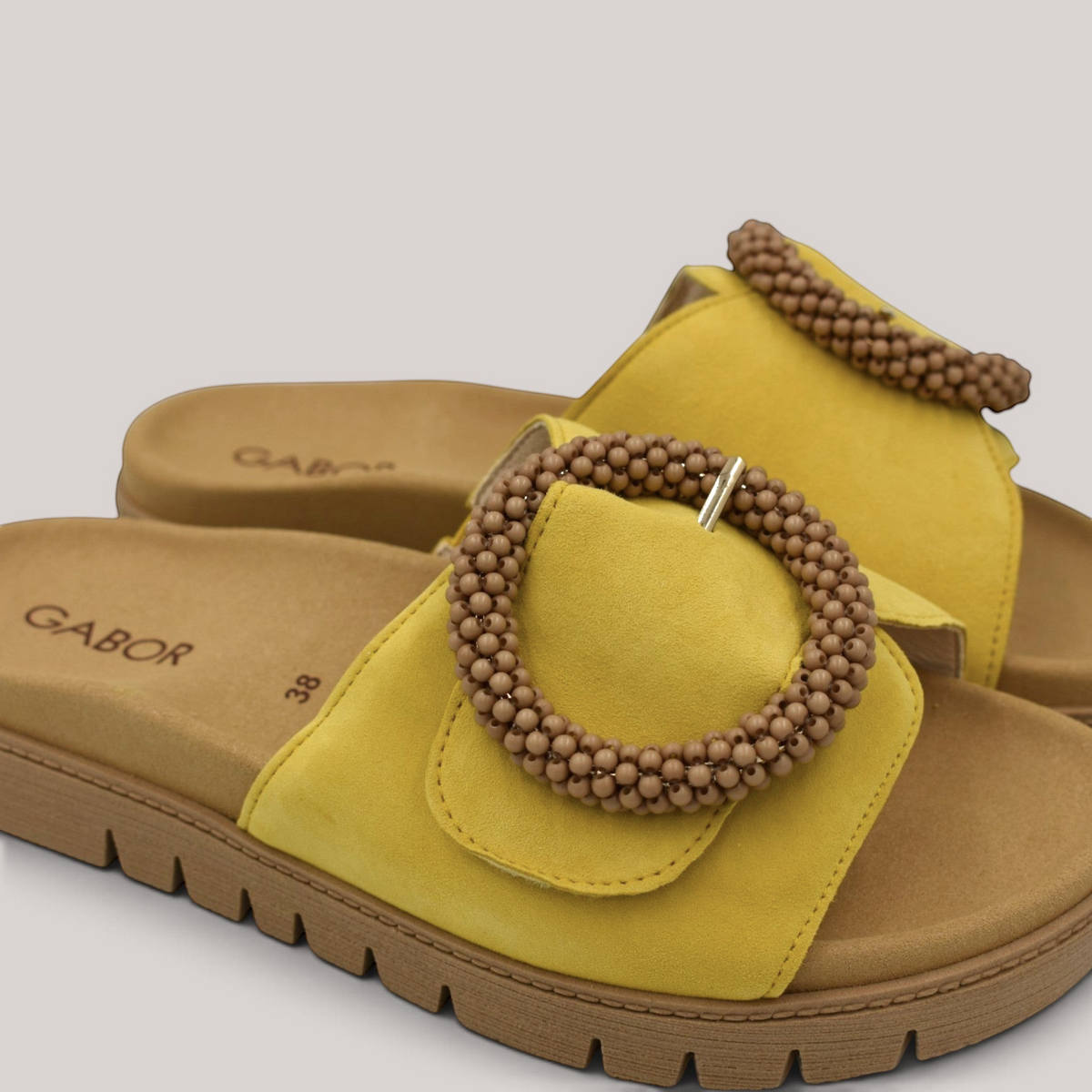 Grundy's Shoes Gabor 83745 yellow nubuck leather slide sandals with a beaded buckle and contoured footbed
