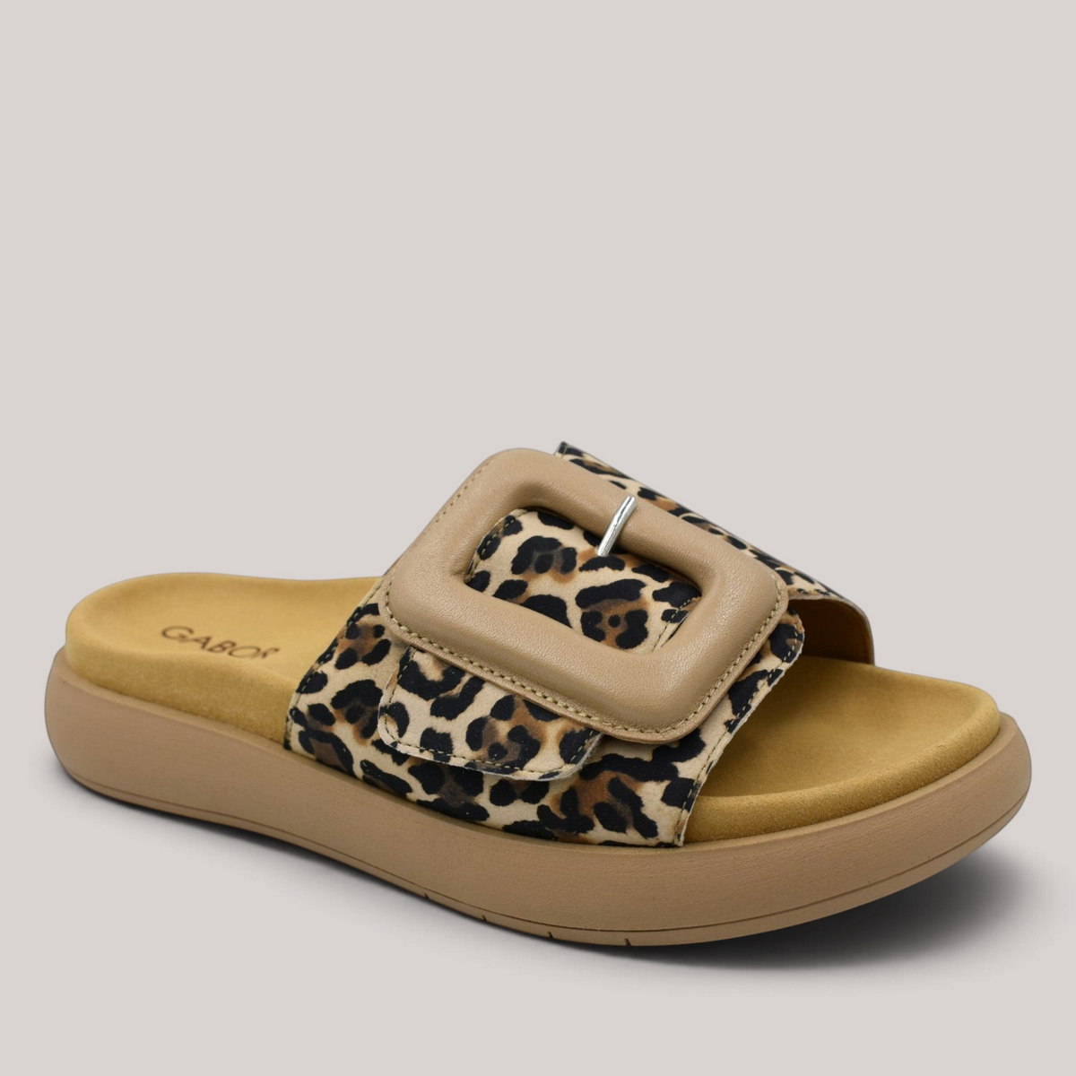 Grundy's Shoes Gabor leopard print suede slide sandal with a large beige buckle and contoured footbed.