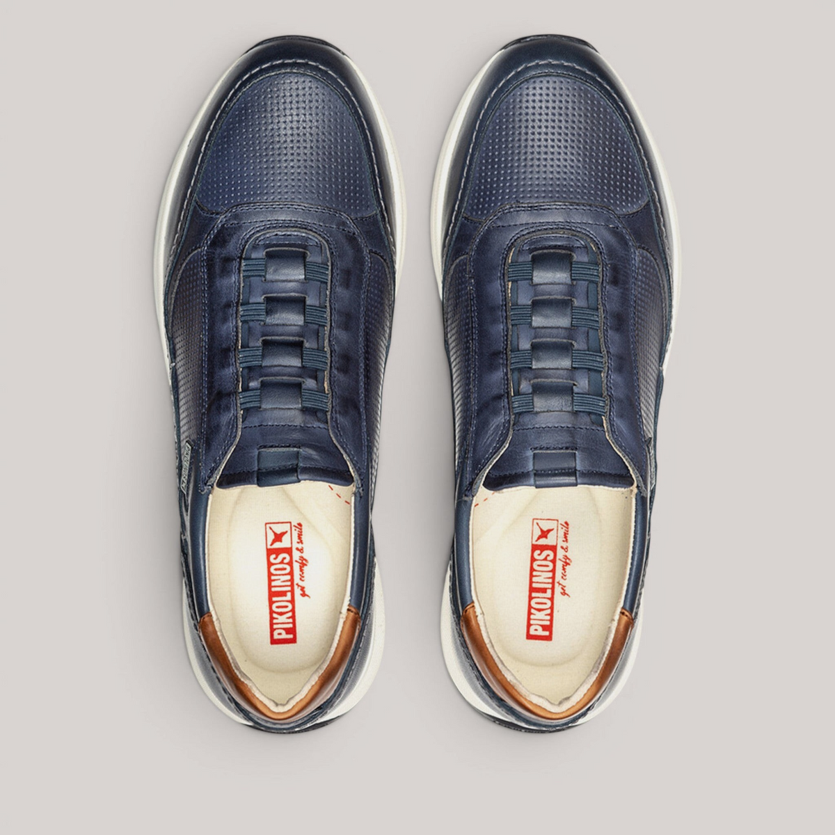 Grundy's Shoes Pikolinos Getafe navy blue leather trainers with elastic laces and white lightweight soles