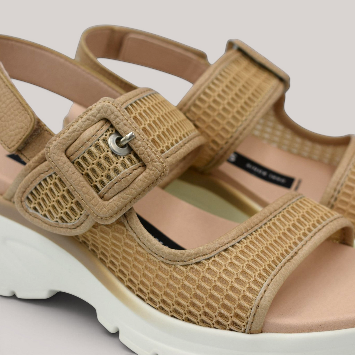 Grundy's Shoes Hispanitas Cedro wedge sandal in beige mesh and leather with buckle and velcro strap closure.