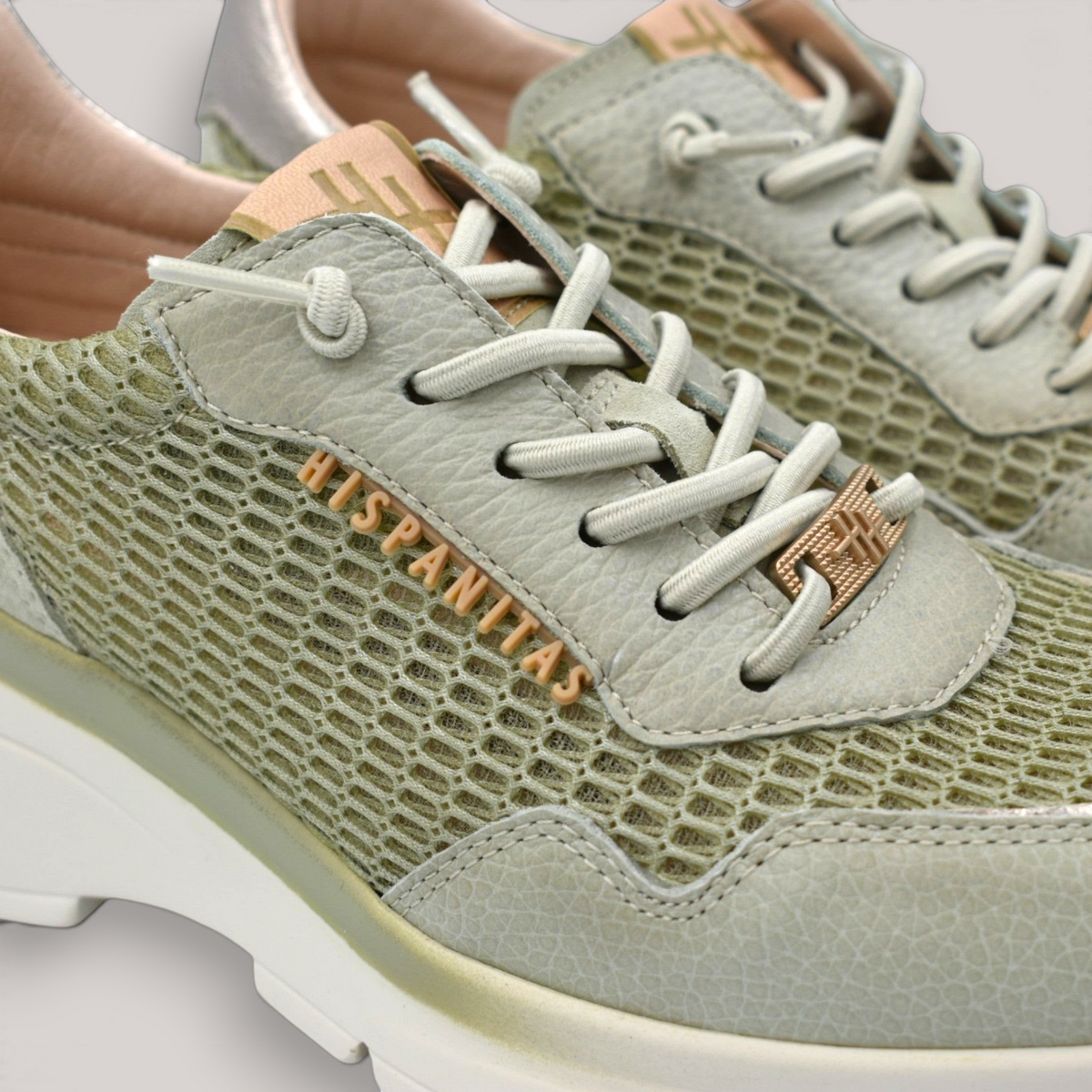 Grundy's Shoes Hispanitas jade lace-up sneaker with premium leather, breathable mesh, and a wedge heel.