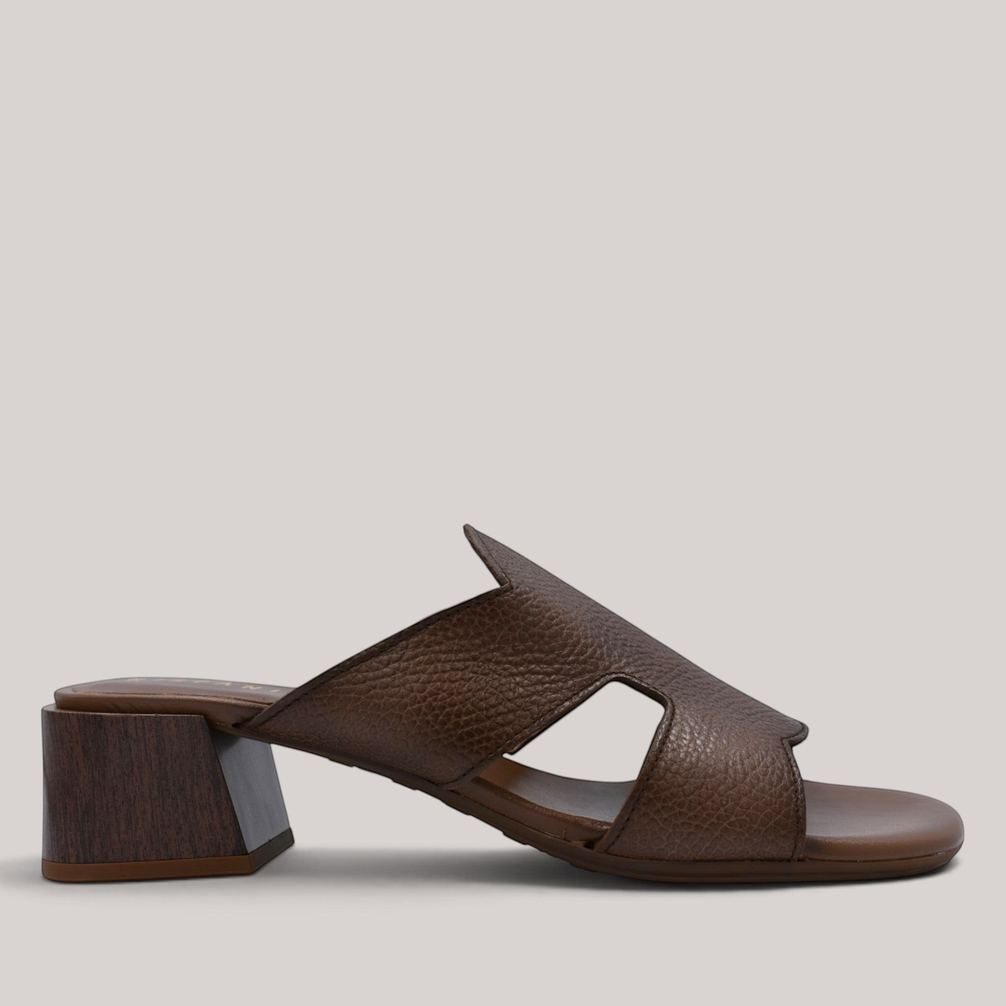 Grundy's Shoes Hispanitas brown leather slip-on heels with a block wood-effect heel and Triflow cushioning technology.