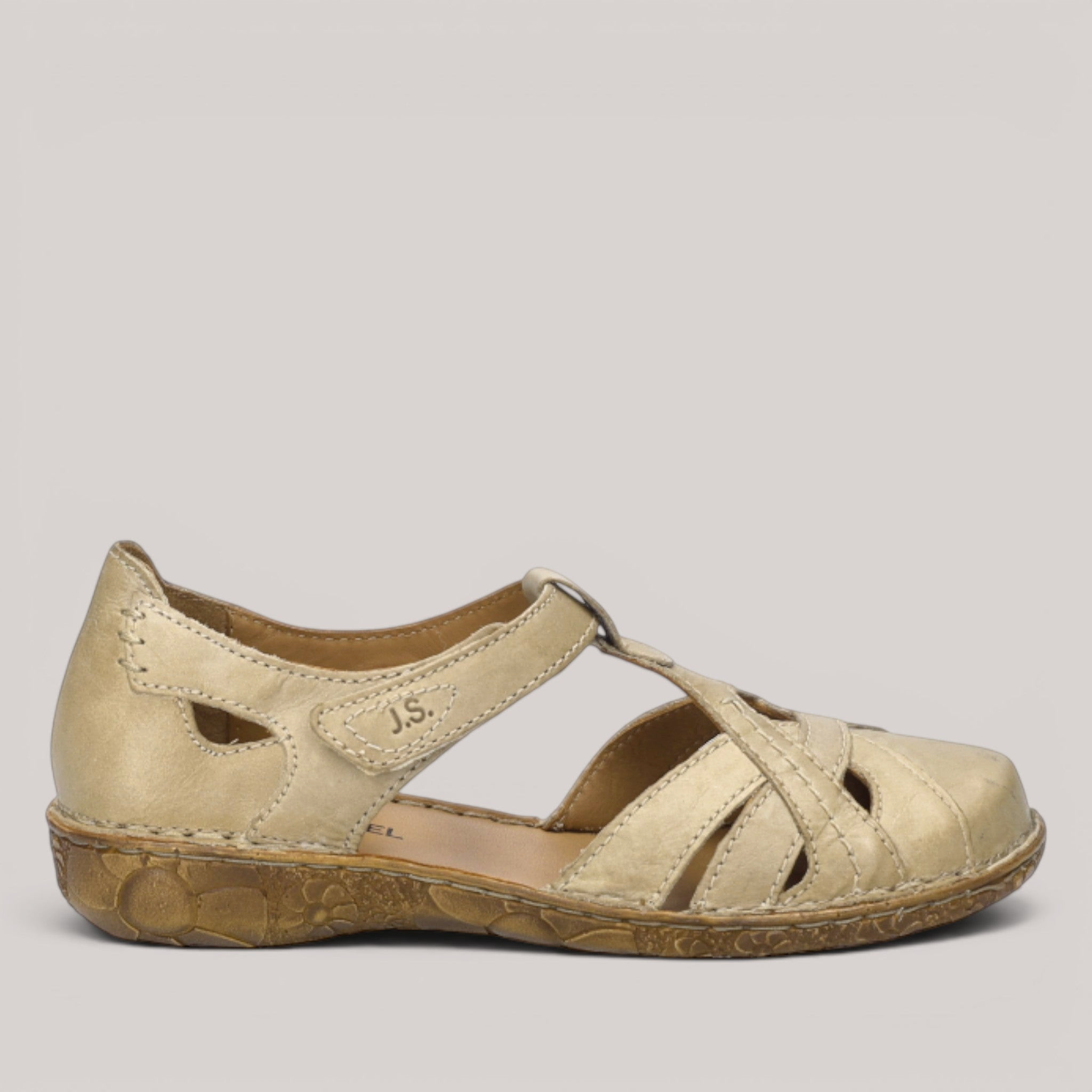 Grundy's Shoes Josef Seibel Rosalie 29 beige leather sandal with decorative stitching and Velcro strap closure.