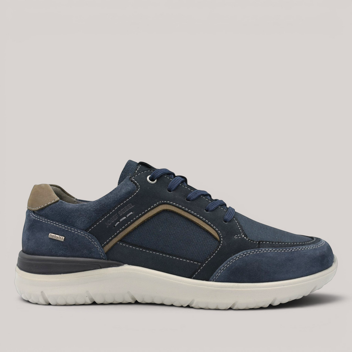 Grundy's Shoes Josef Seibel Wales 51 navy suede and mesh waterproof trainers with a lightweight EVA sole.