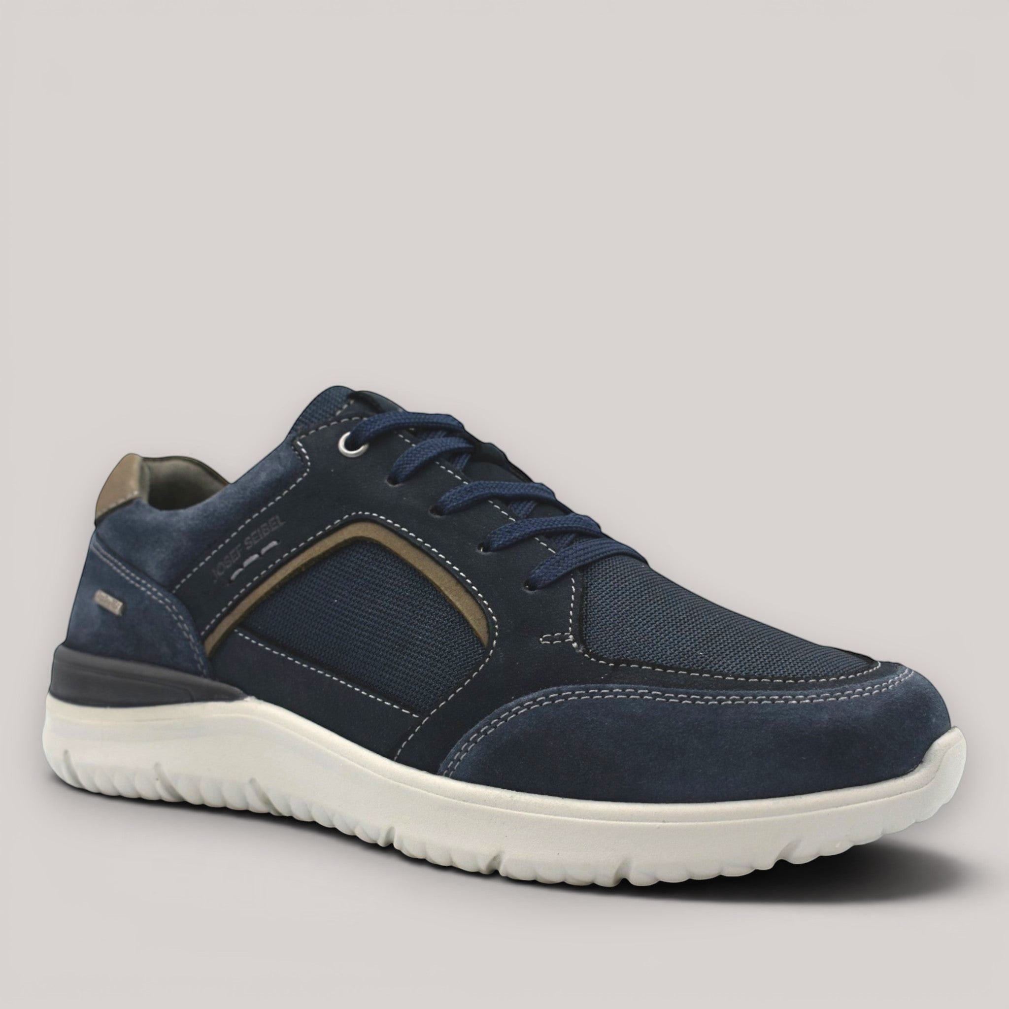 Grundy's Shoes Josef Seibel Wales 51 navy suede and mesh waterproof sneaker with a white lightweight EVA sole.