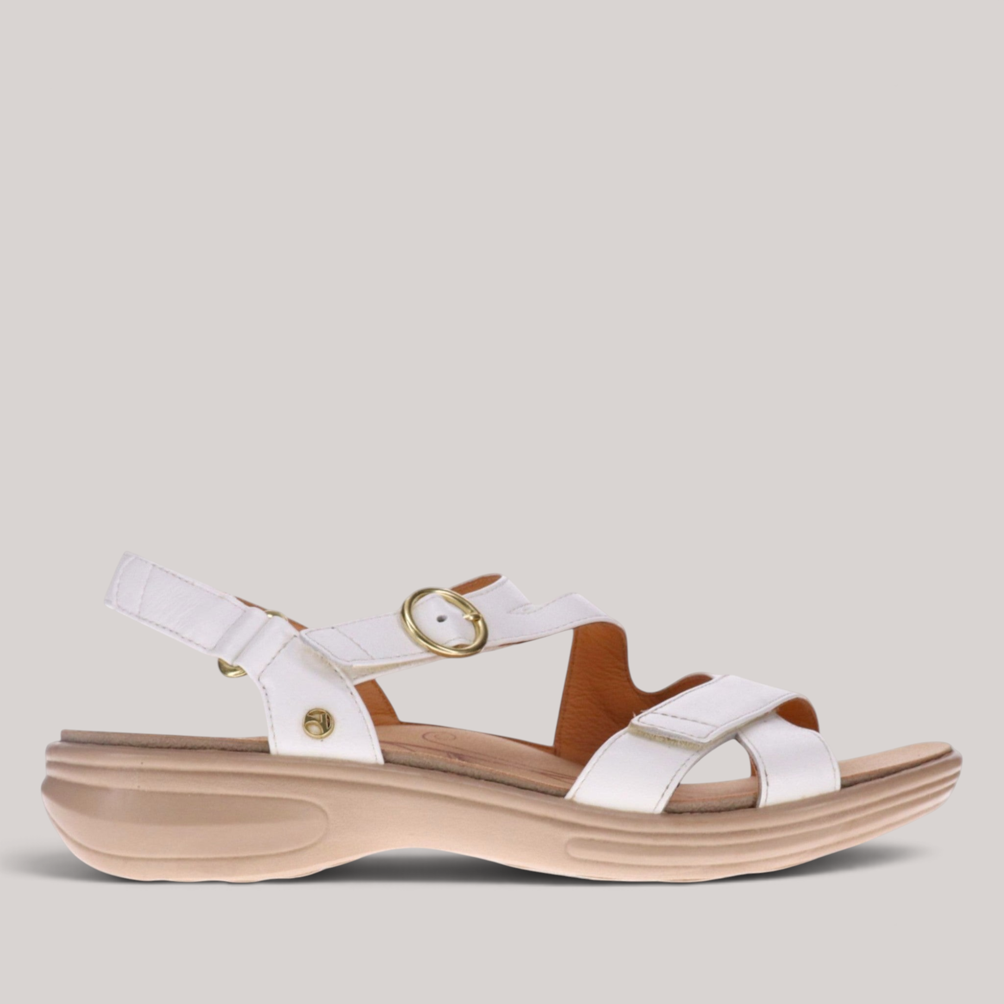 Grundy's Shoes Revere Nagoya white leather sandal with adjustable straps, gold hardware, and cushioned beige sole.