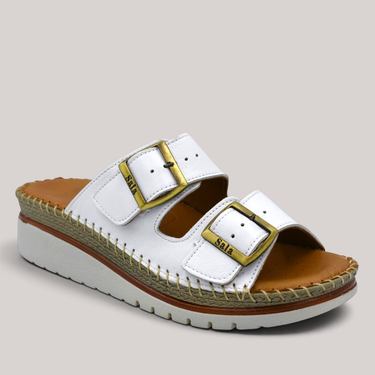 Grundy's Shoes Sala Oasis white leather slip-on sandals with adjustable gold buckles and cushioned platform sole