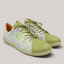 Grundy's Shoes Think 000946 lace-up sneakers in olive green leather with a patterned side panel and flat sole.