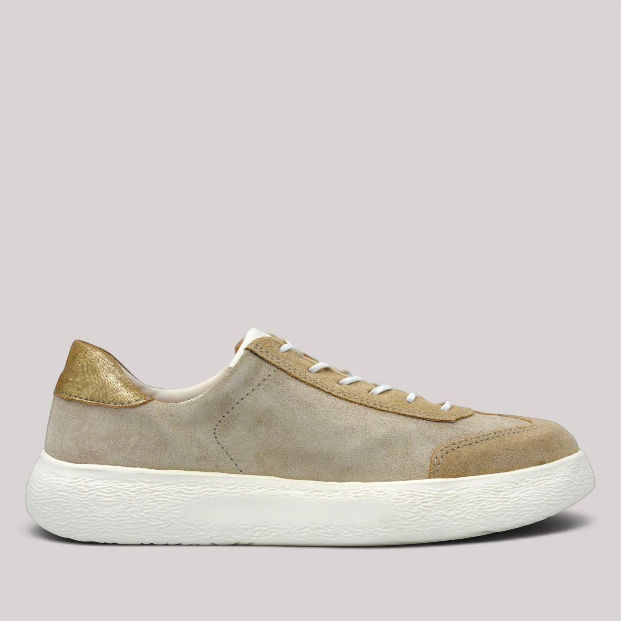 Grundy's Shoes Think lace-up sneaker in beige suede and nubuck leather with a metallic gold heel and white sole.