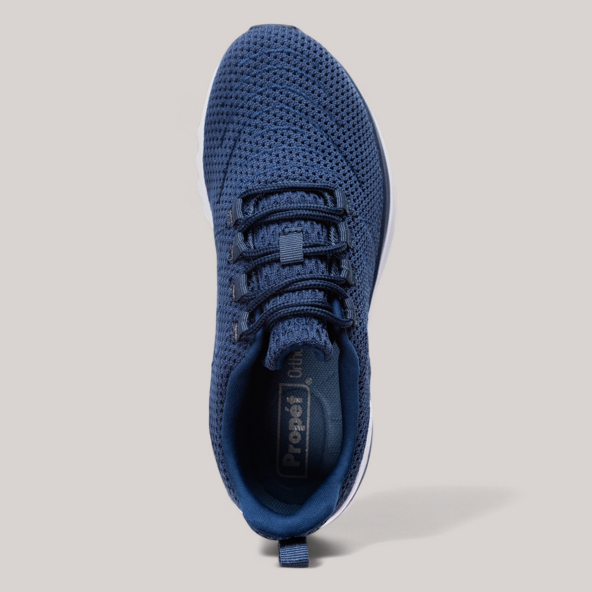 Grundy's Shoes Propet Tour Knit women's navy blue breathable mesh sneaker with cushioned insole and lace-up closure.