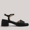 Grundy's Shoes Wonders 2301 black leather sandals with floral die-cut vamp, adjustable strap, and block heel.