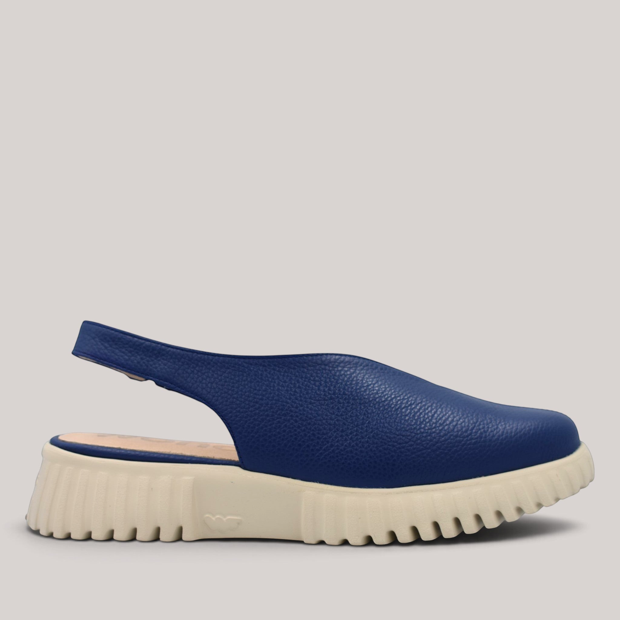 Grundy's Shoes Wonders 4411 navy blue leather slingback shoes with a lightweight beige platform sole